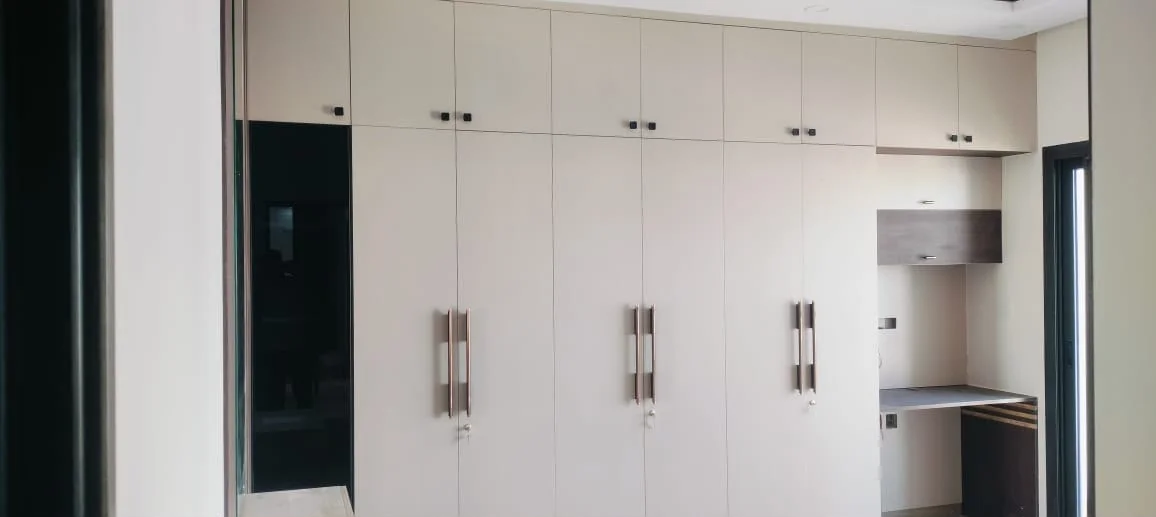Ram Royal Interiors work photograph 5: wardrobes & storage in a residential interior